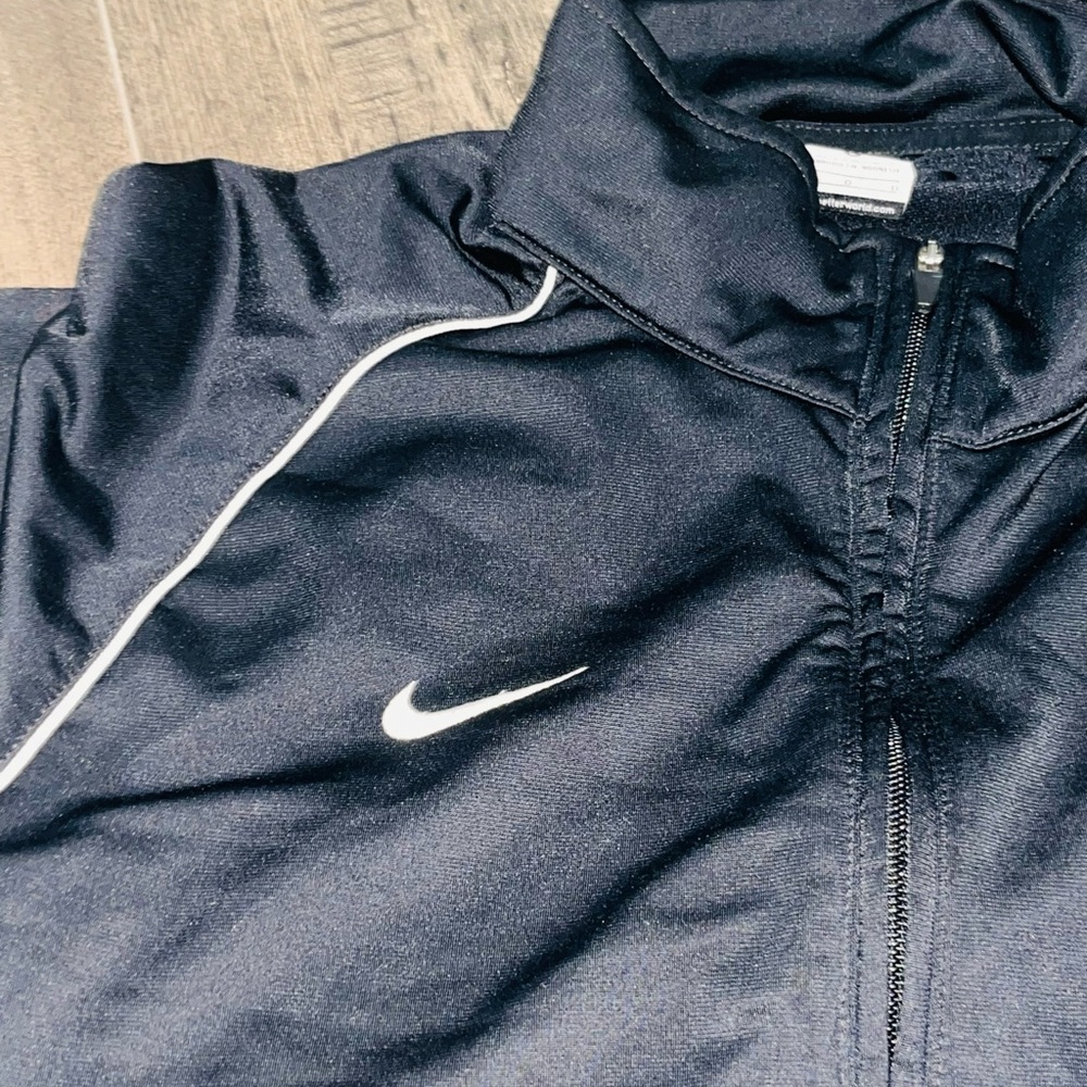 Nike. Air. SportsWear Repel Black Jacket